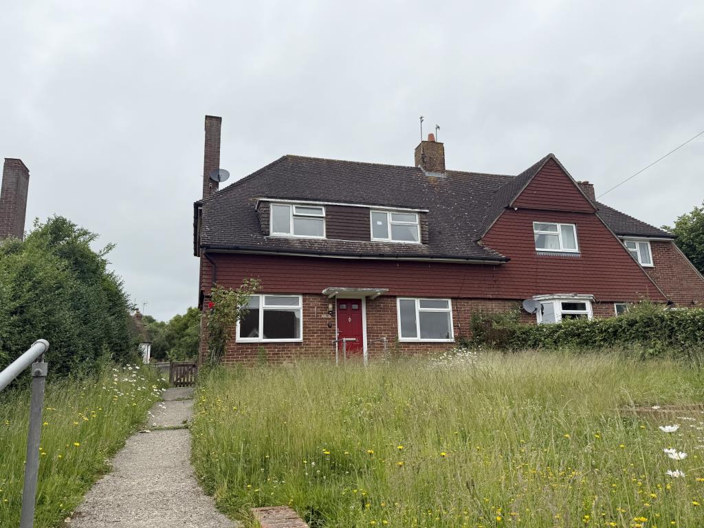 Lot: 135 - SEMI-DETACHED HOUSE IN NEED OF IMPROVEMENT IN VILLAGE SETTING - Front View of Village House in Need of Improvement